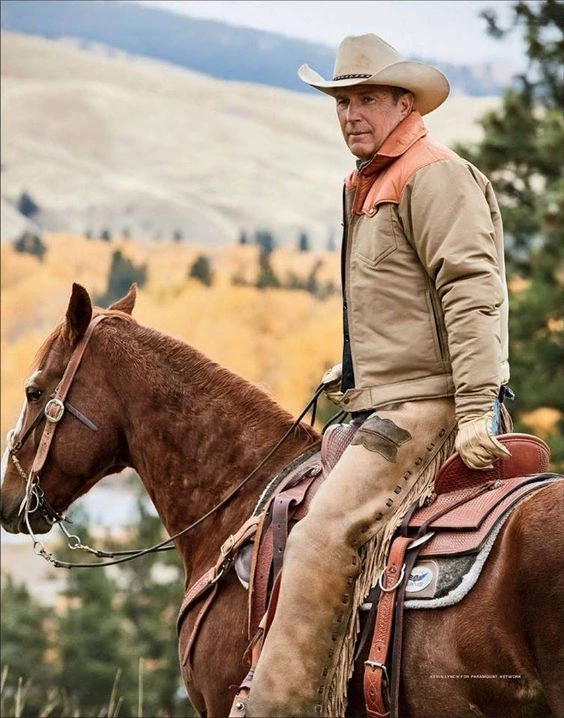 john dutton wearing beige and orange cotton jacket