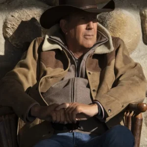 john dutton sitting and wearing beige leather jacket yellowstone