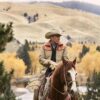 kevin costner in yellowstone wearing beige and orange cotton jacket