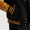 mens black wool and gold leather varsity letterman jacket pocket close-up
