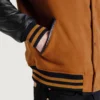 men's brown wool and black leather varsity letterman jacket pocket close-up