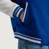 men's royal blue wool and white leather varsity jacket pocket close-up