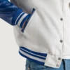 mens white wool and blue leather varsity letterman jacket pocket close-up