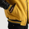 mens yellow wool and black leather varsity letterman jacket pocket close-up