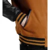 womens brown wool and black leather varsity letterman jacket pocket close-up