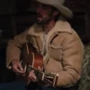 yellowstone walker playing guitar with sheepskin leather shearling jacket